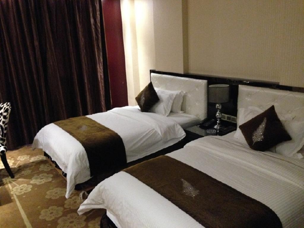 Tianguo Times Hotel Foshan Habitación foto